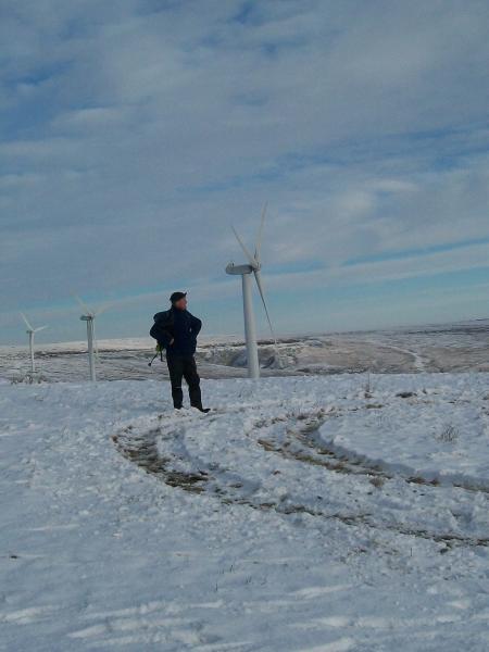 Andy is nearly as tall as the turbine