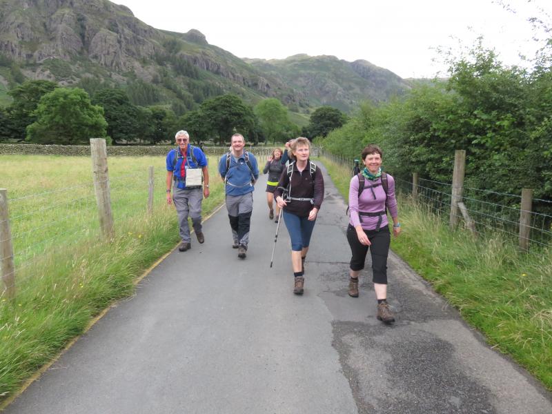 Happy walkers setting out Happy walkers setting out